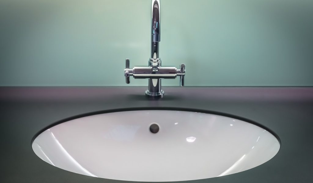 Image of a modern sink with the text 'Fourways Plumbing' overlayed, representing plumbing services